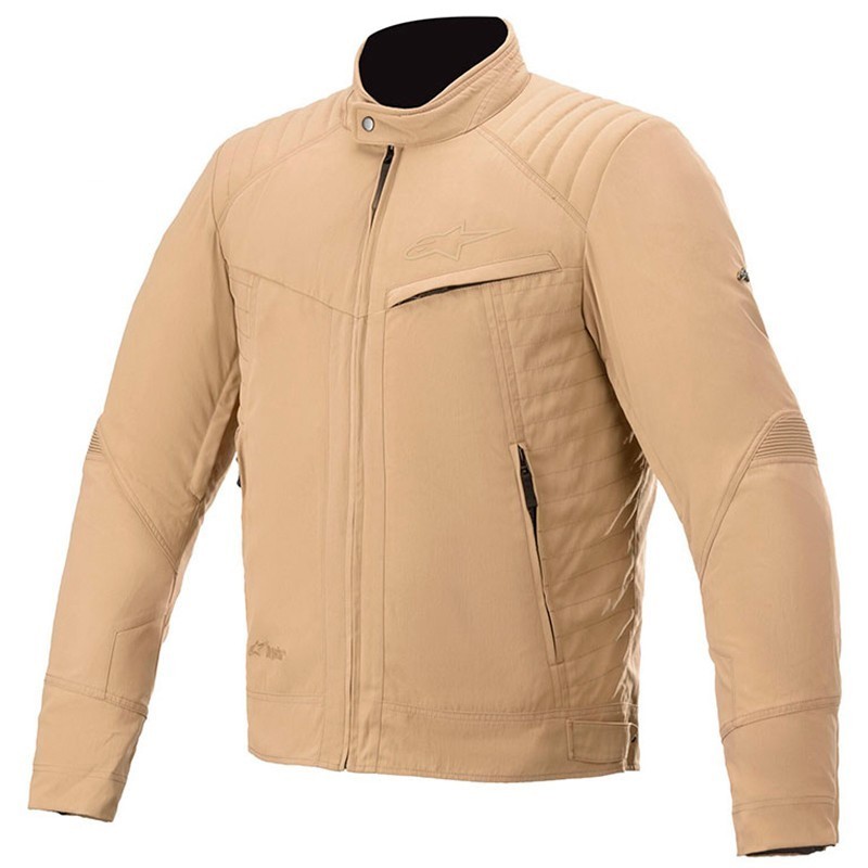 A photograph showing the napoleon waterproof inner pocket and numerous  closing zippers of the Alpinestars Hyper Drystar three-season motorcycle  jacket - Motorcycle Gear Hub